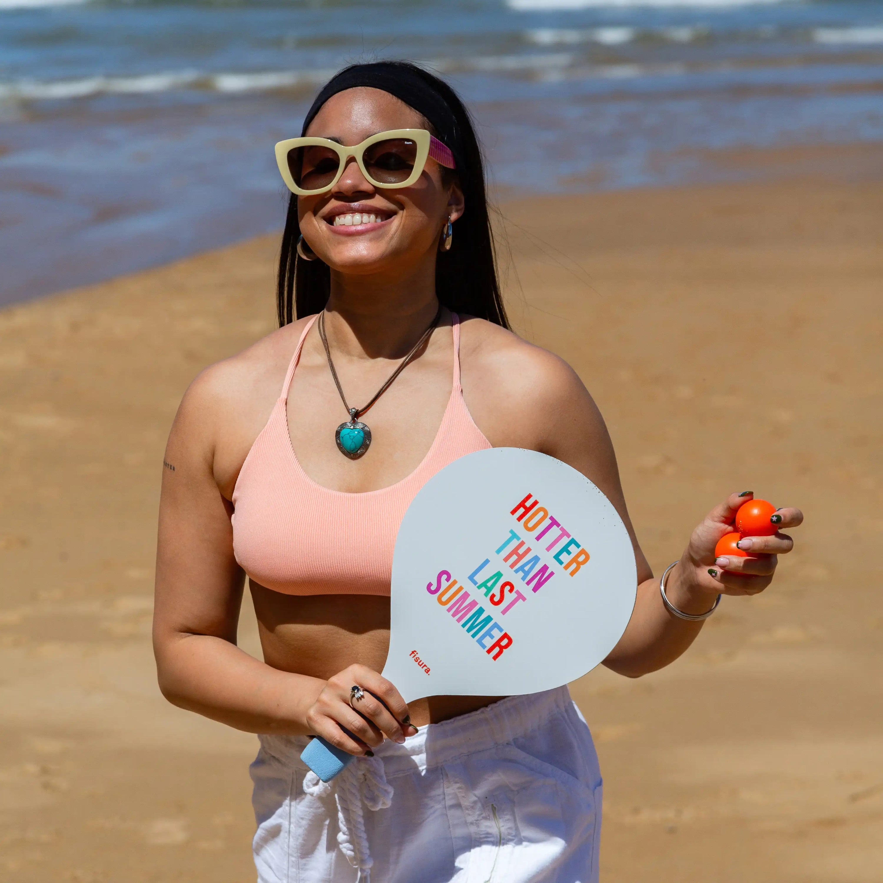 Palas de playa “Hotter than last summer"