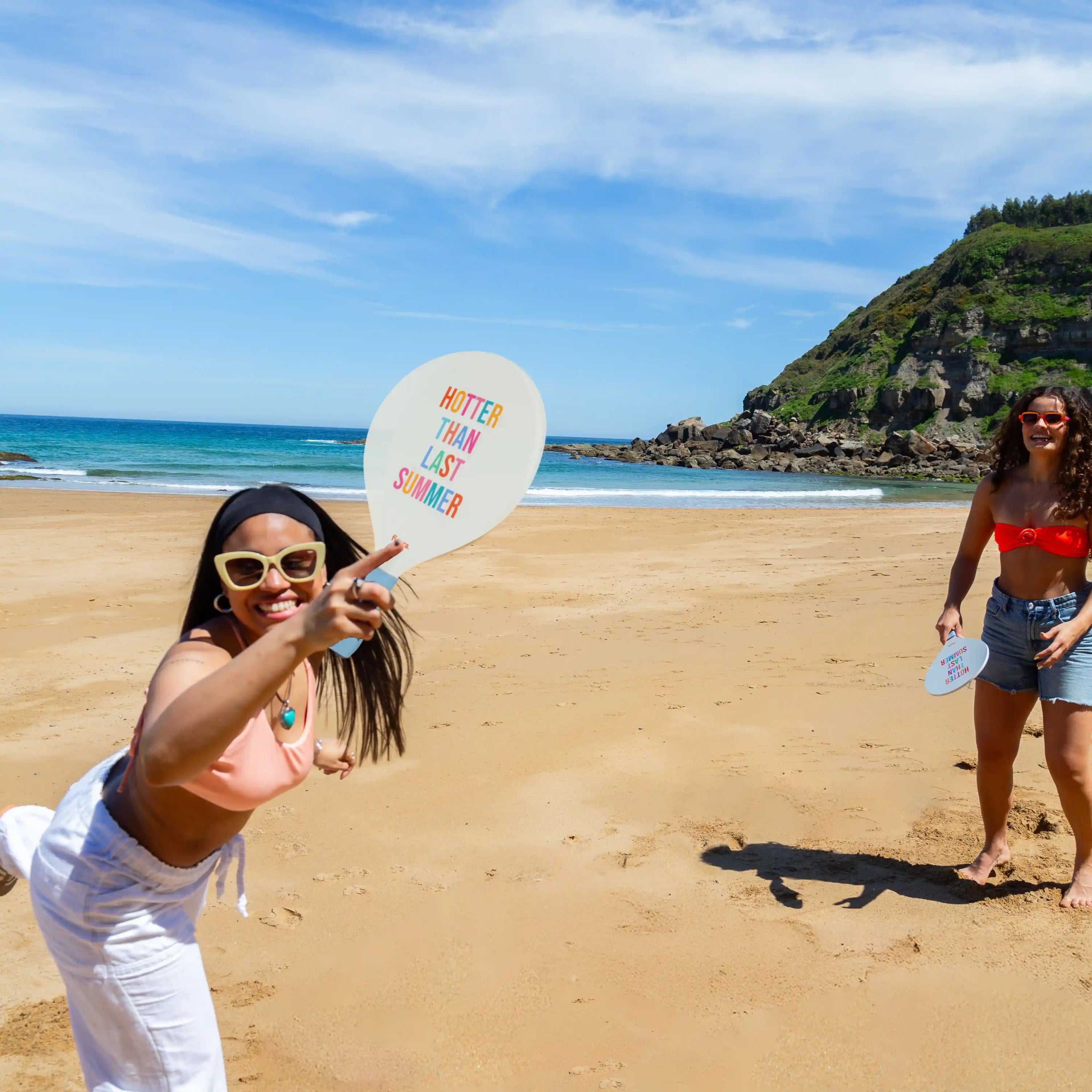 Palas de playa “Hotter than last summer"