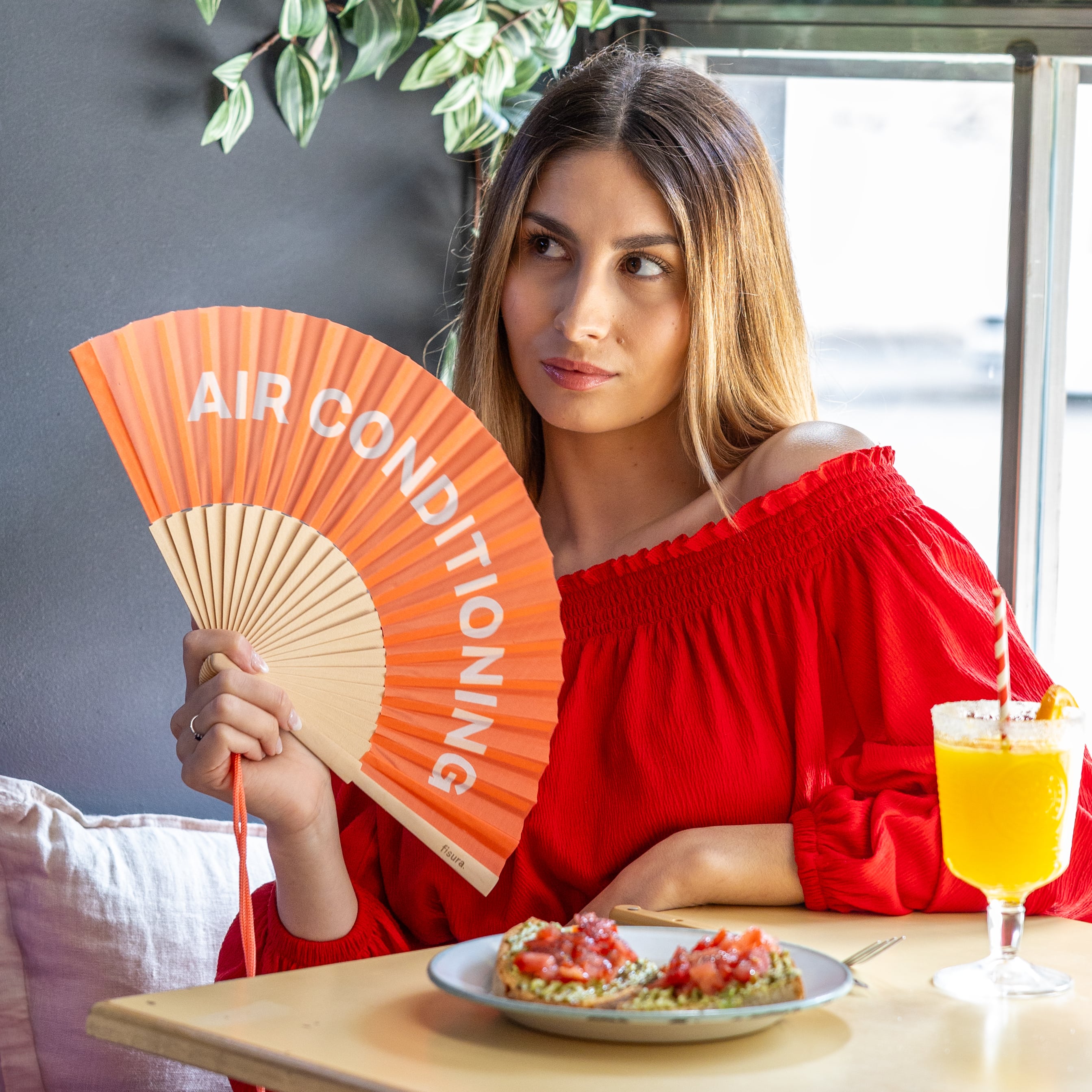 Abanico "Air conditioning" naranja