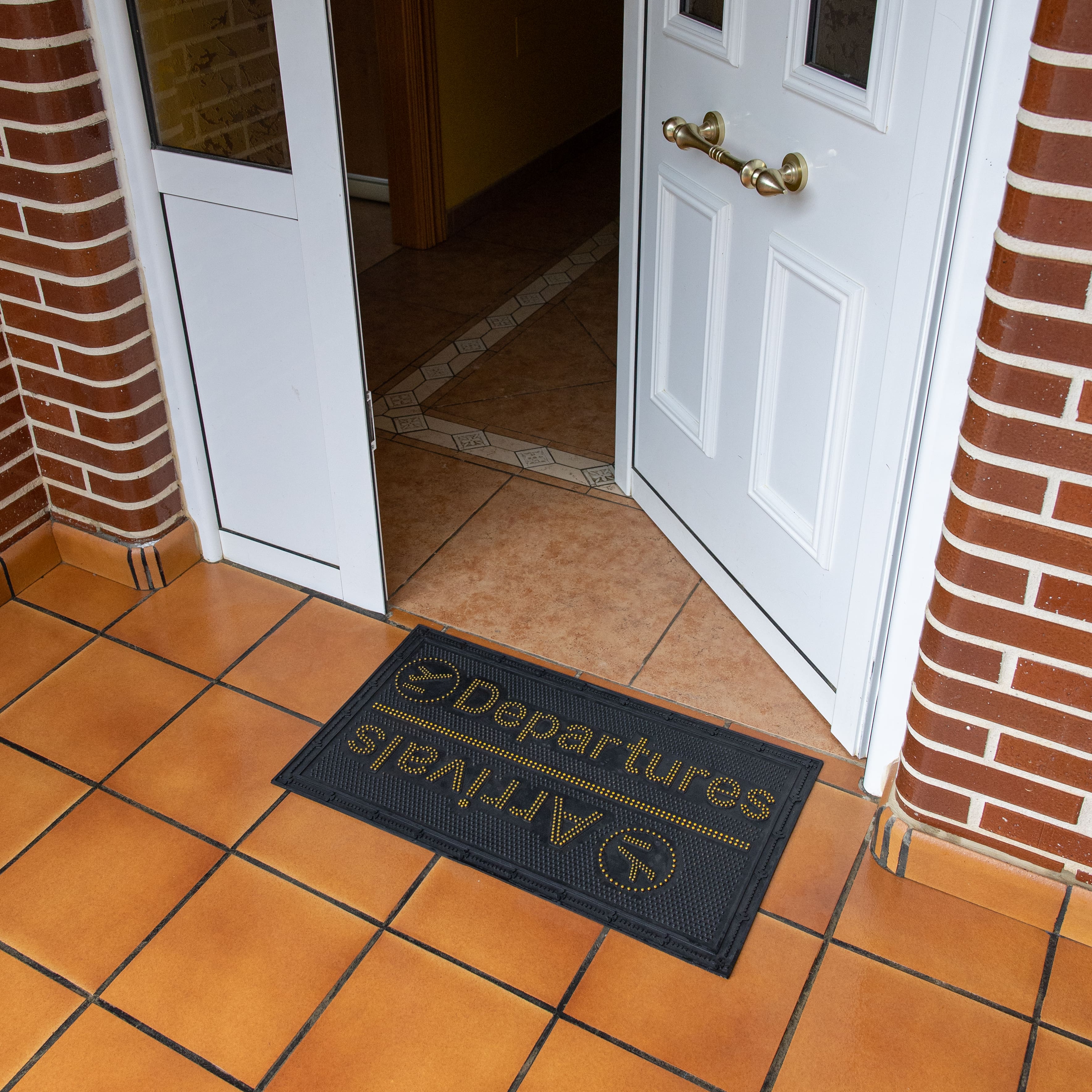 Felpudo de goma “Arrivals/Departures”