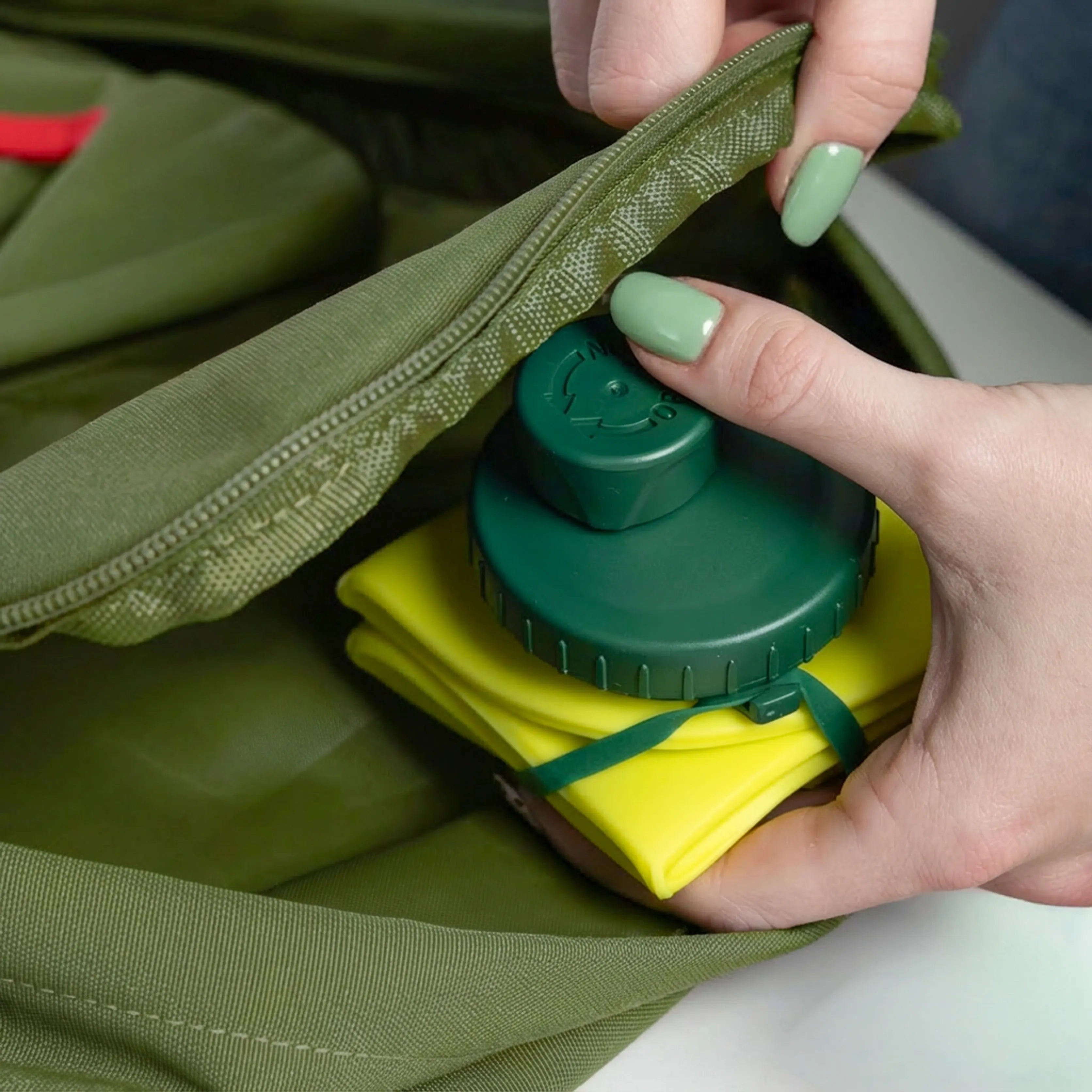 Botella plegable "I'm not a tourist"