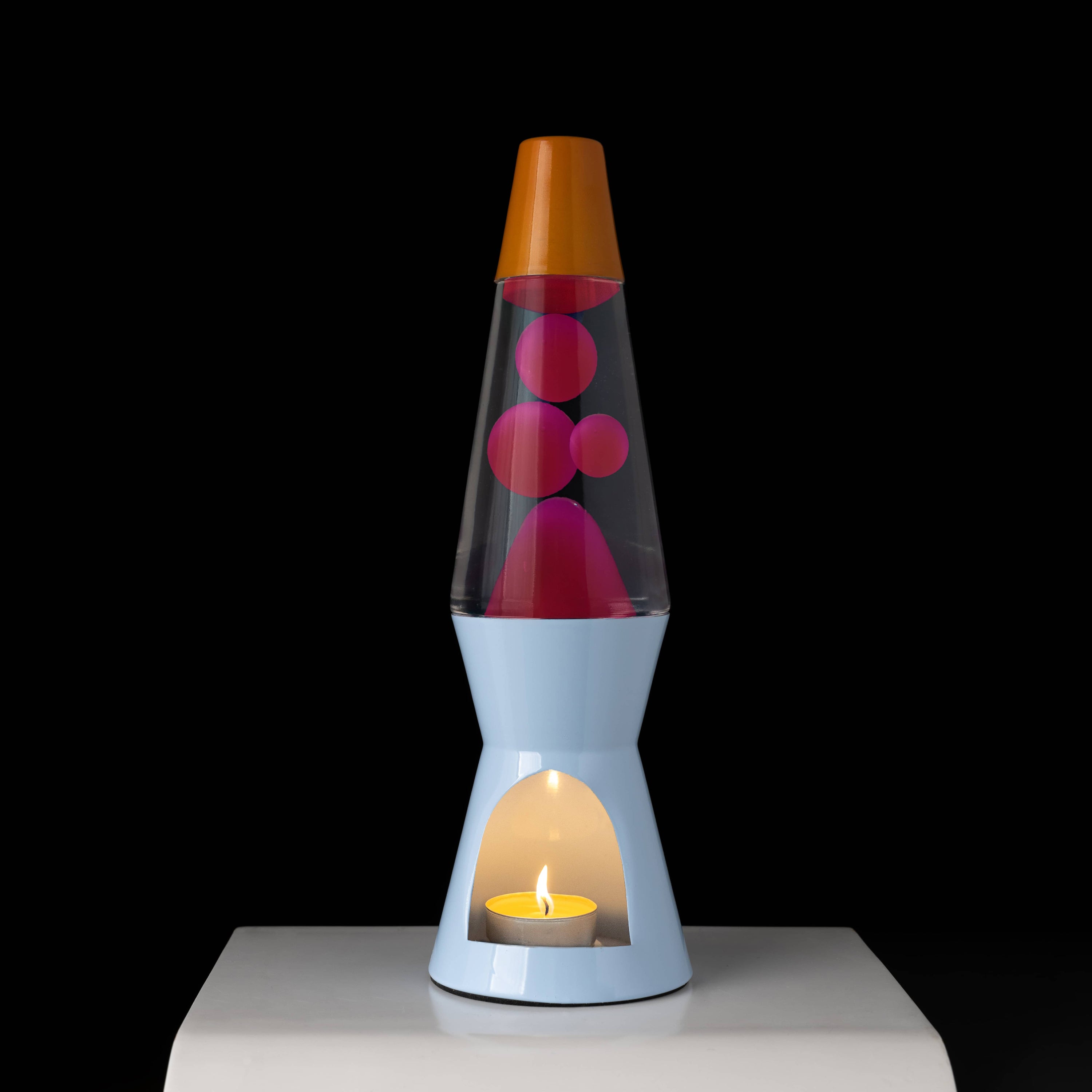 Lámpara de lava vela naranja, rosa y azul