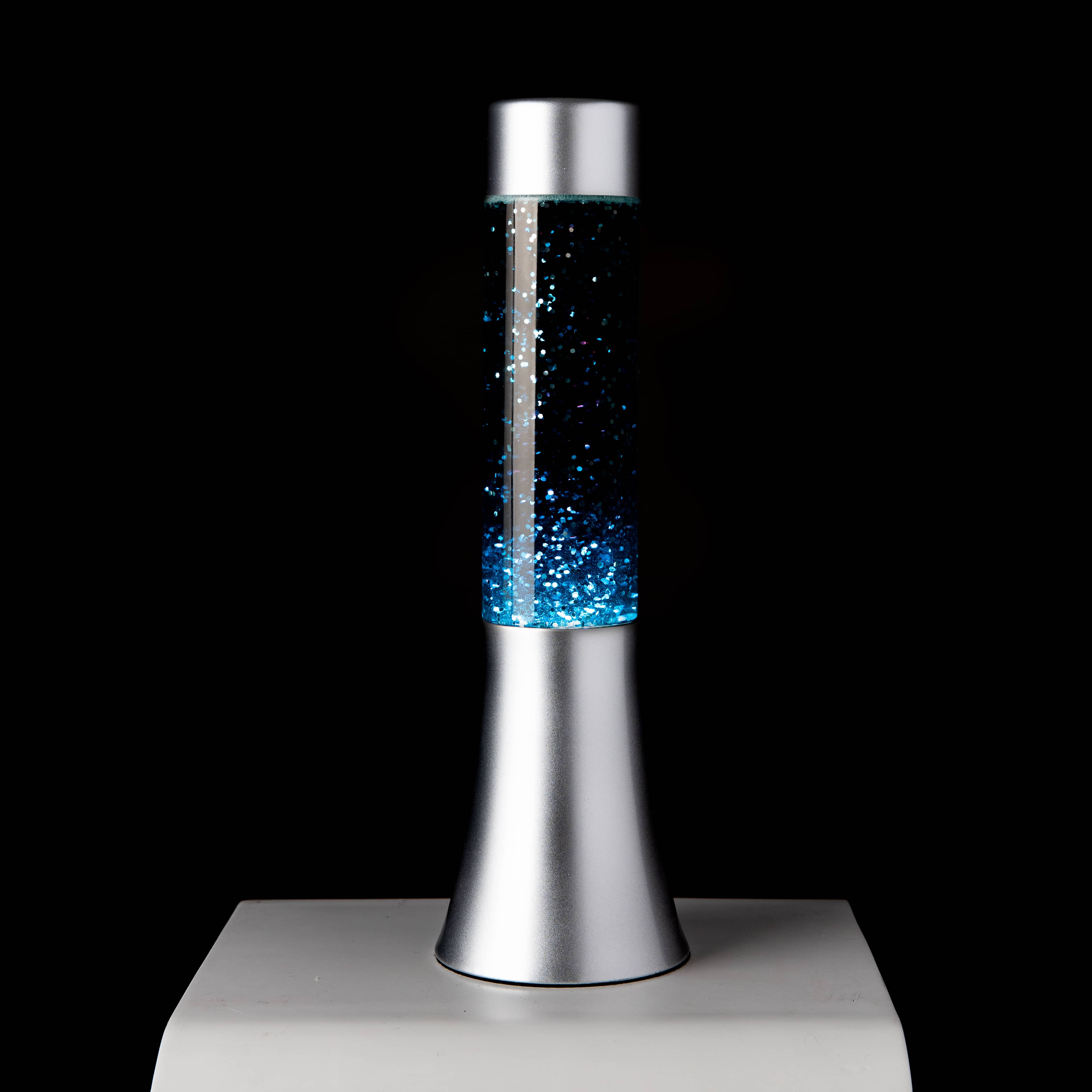 Lámpara de lava glitter de 30 cm con base plateada y líquido azul