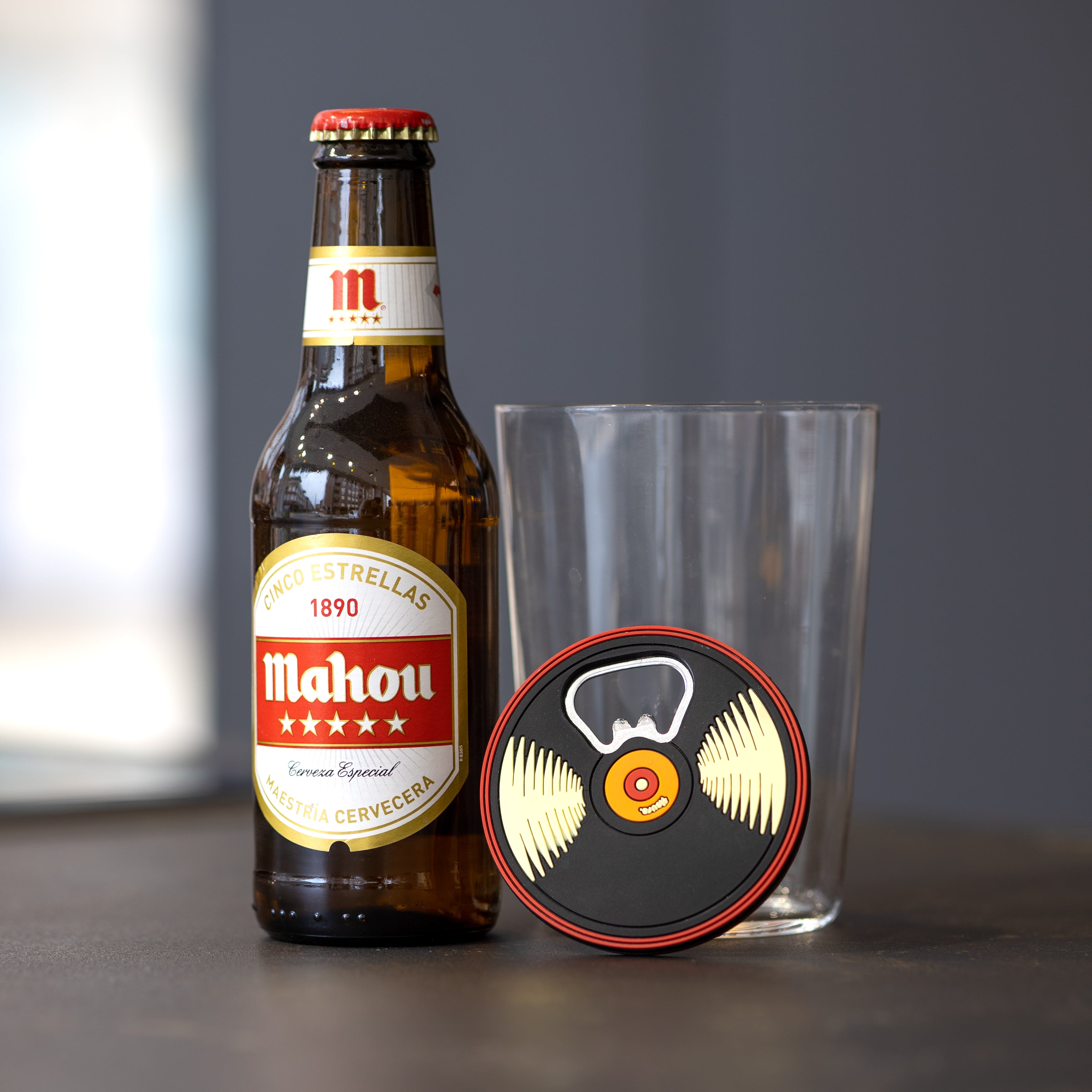 Abridor de botellas "vinilo"