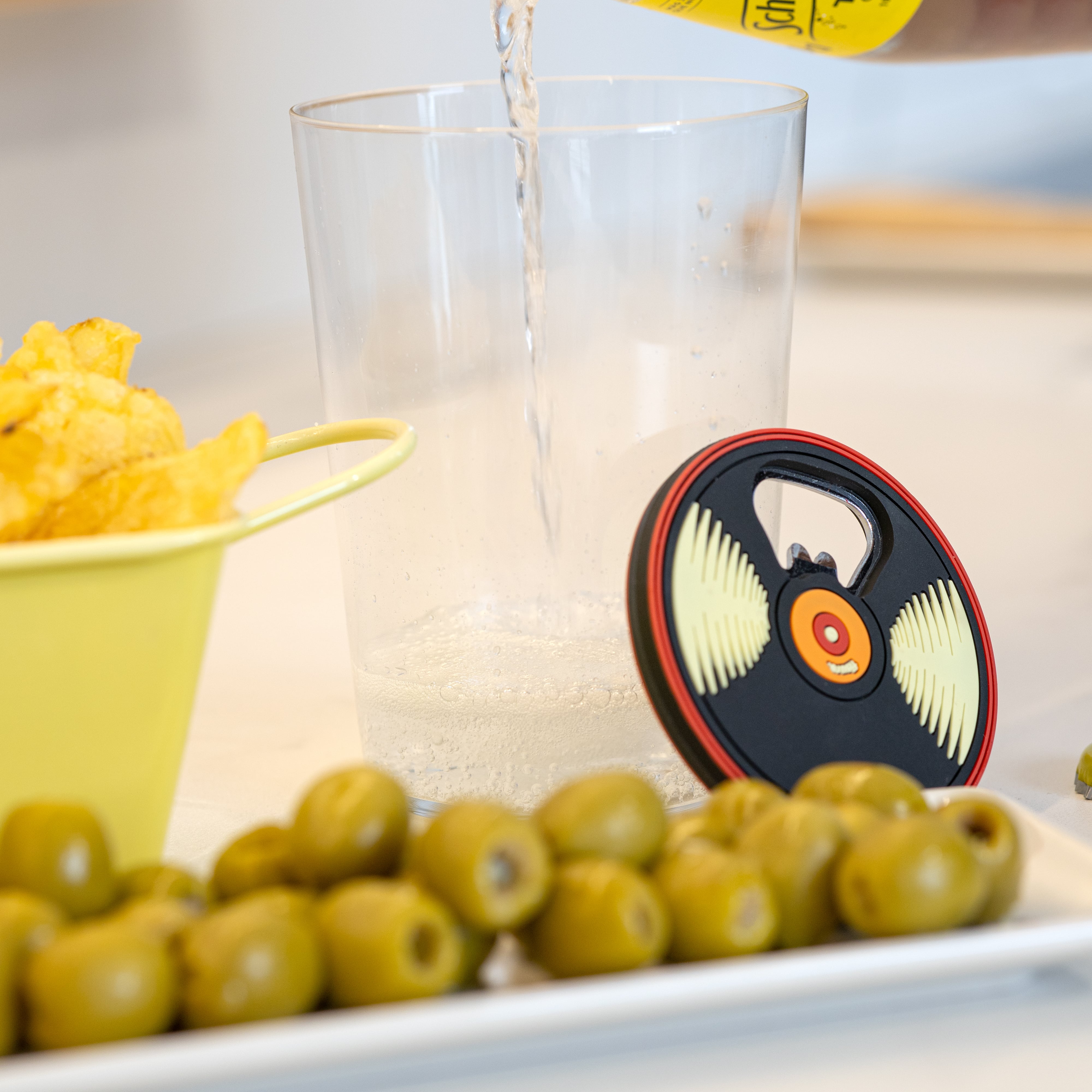 Abridor de botellas "vinilo"