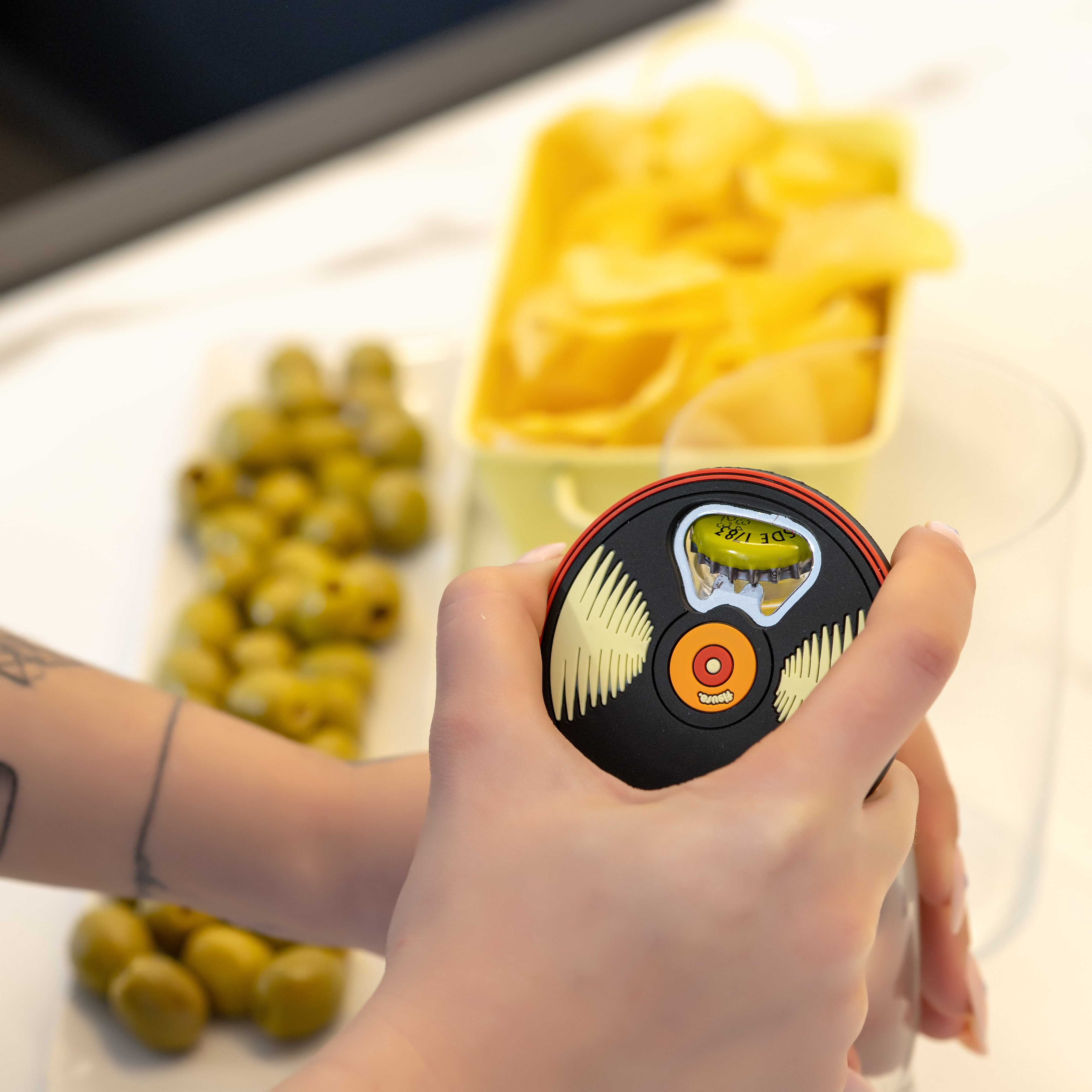 Abridor de botellas "vinilo"