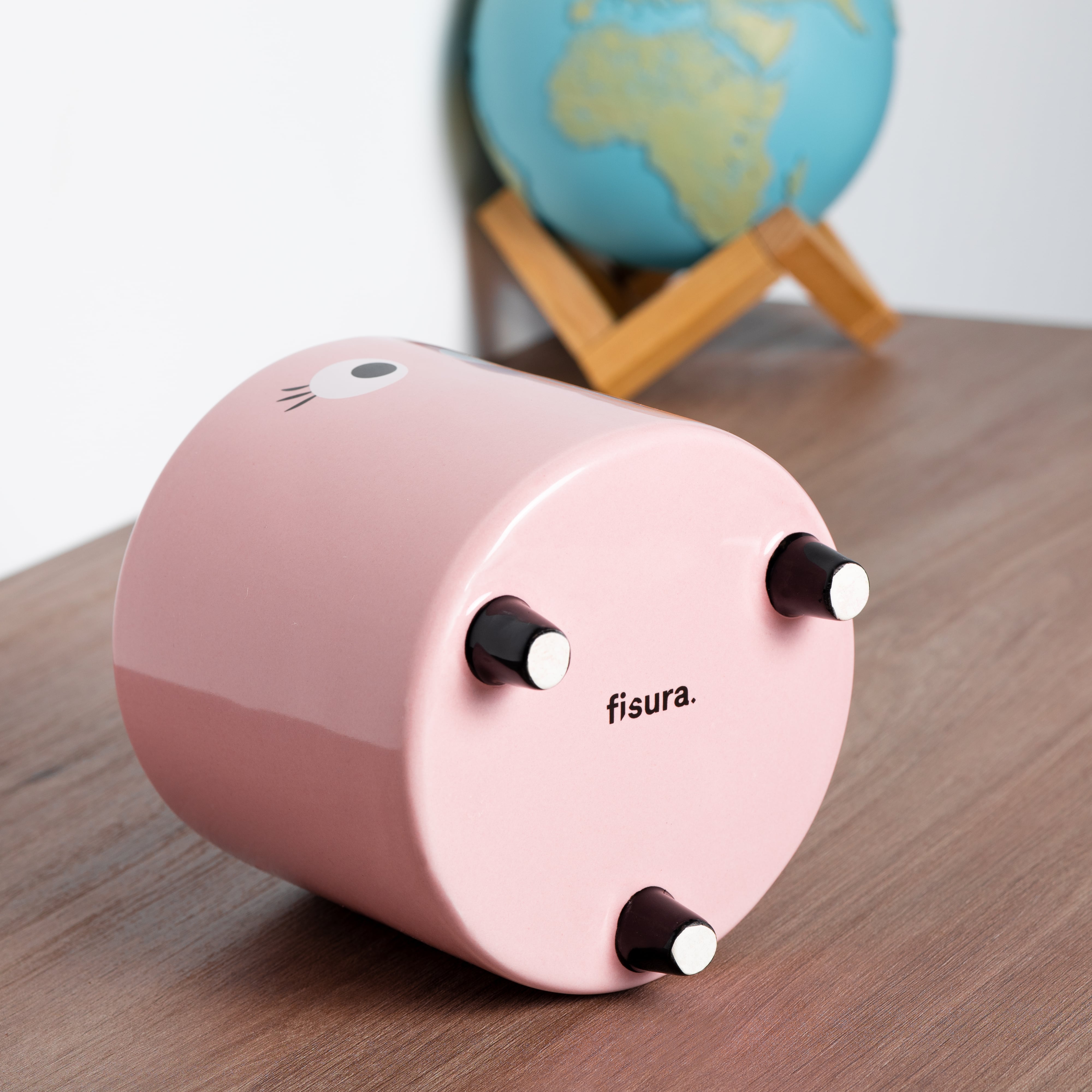 Macetero con ojos rosa