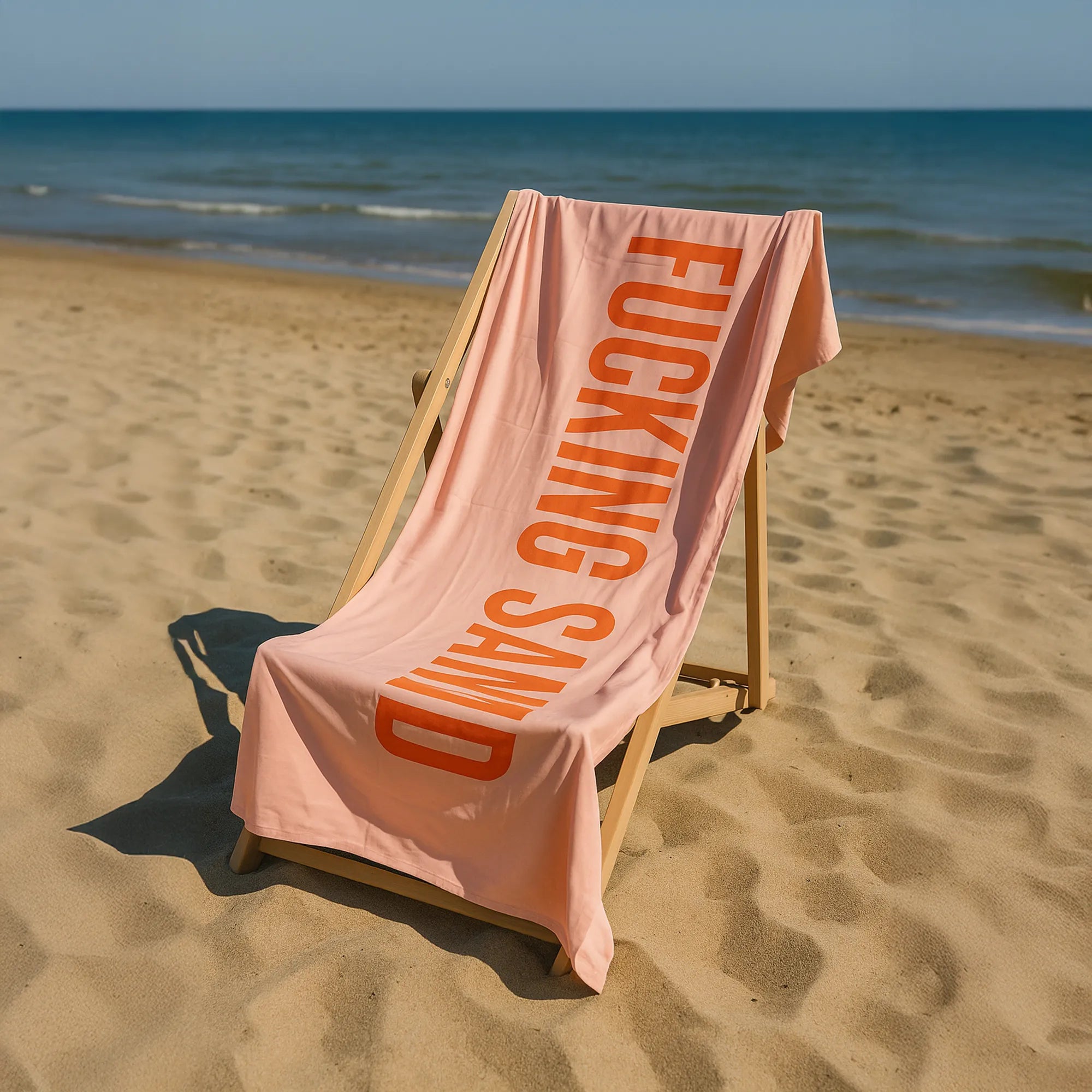 Toalla playa "fucking sand" naranja