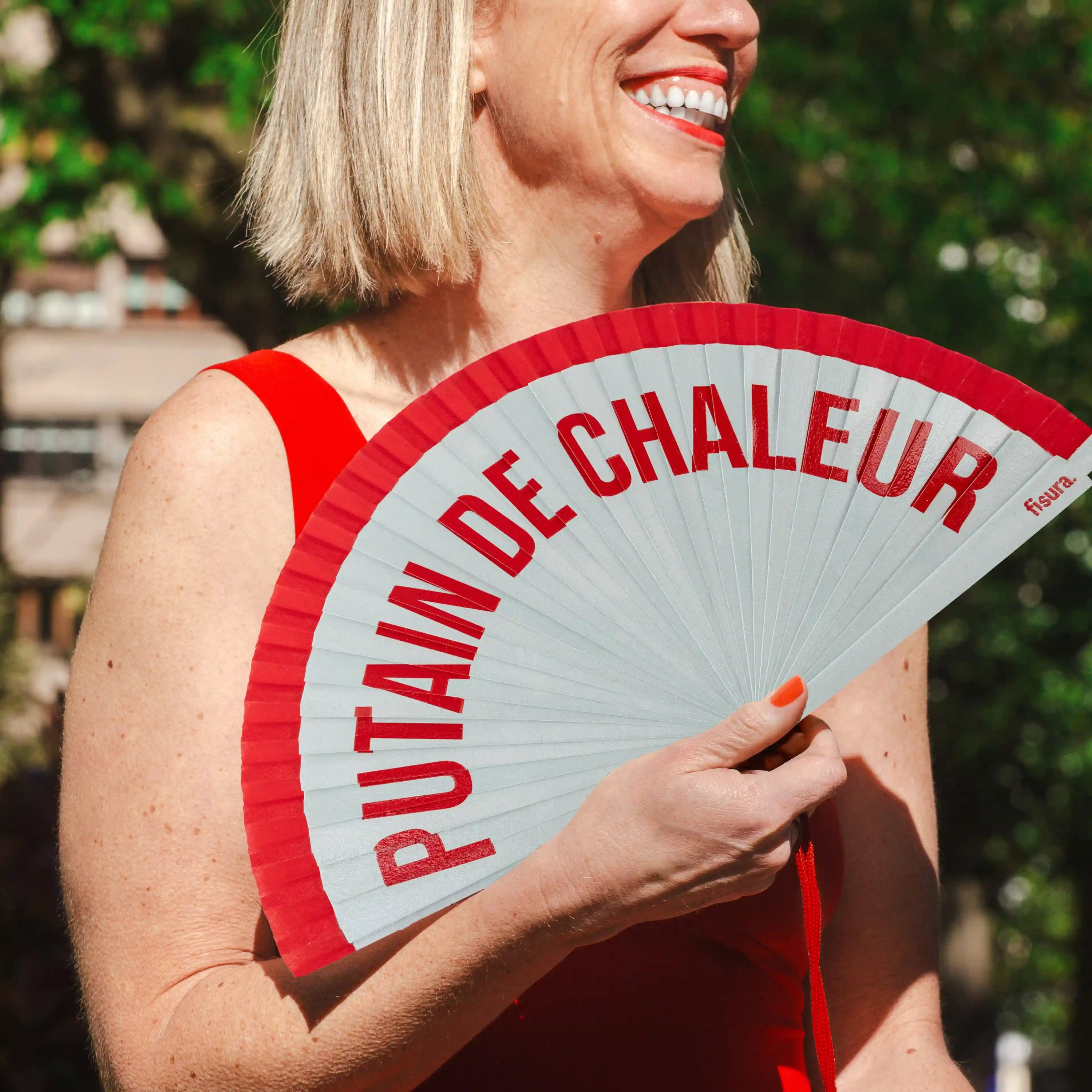 Abanico pintado "Putain de chaleur" rojo