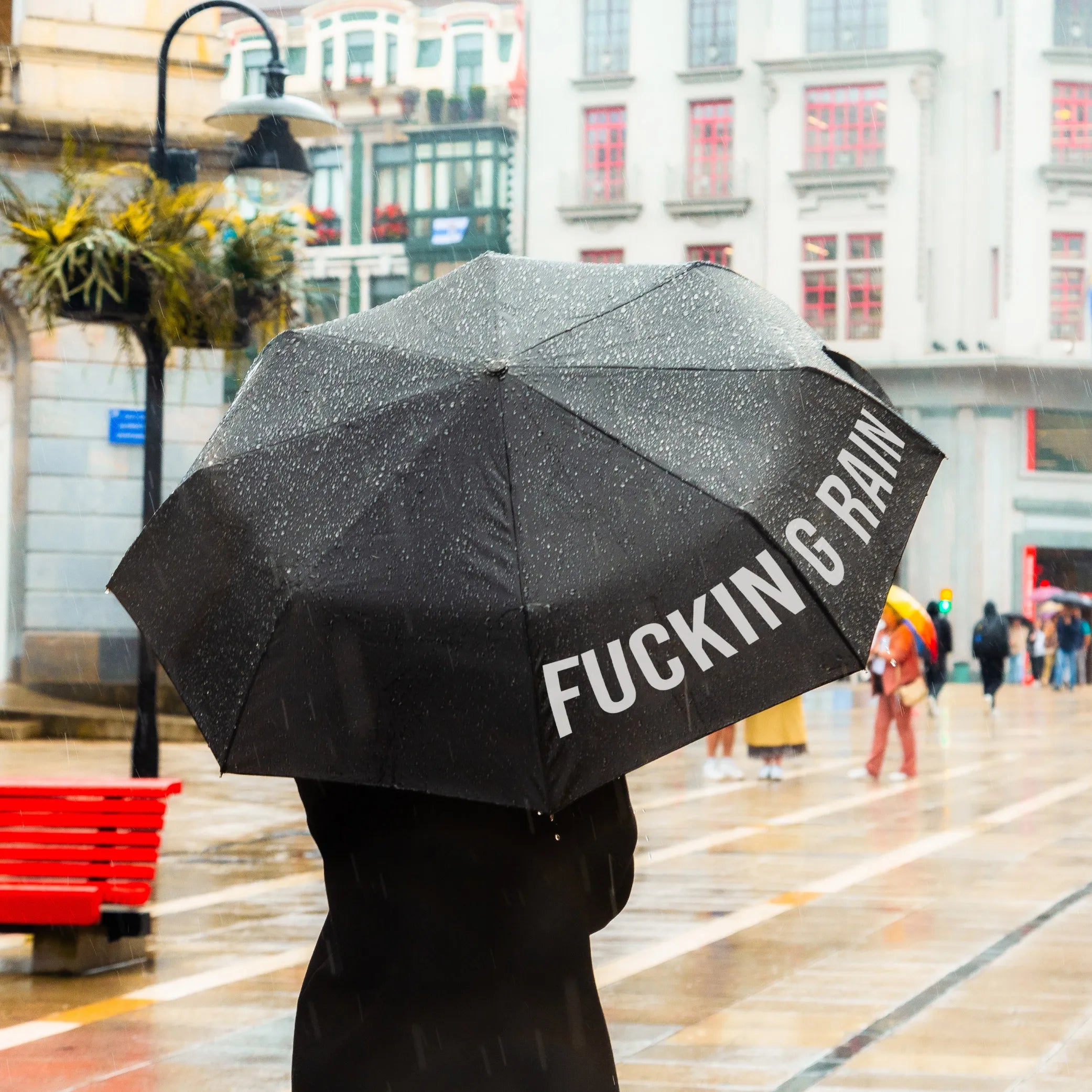 Paraguas plegable "Fucking Rain" negro