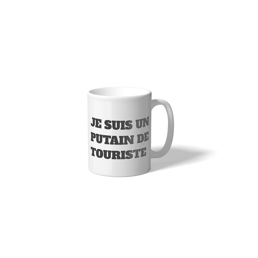 Taza "Je suis un putain de Touriste"