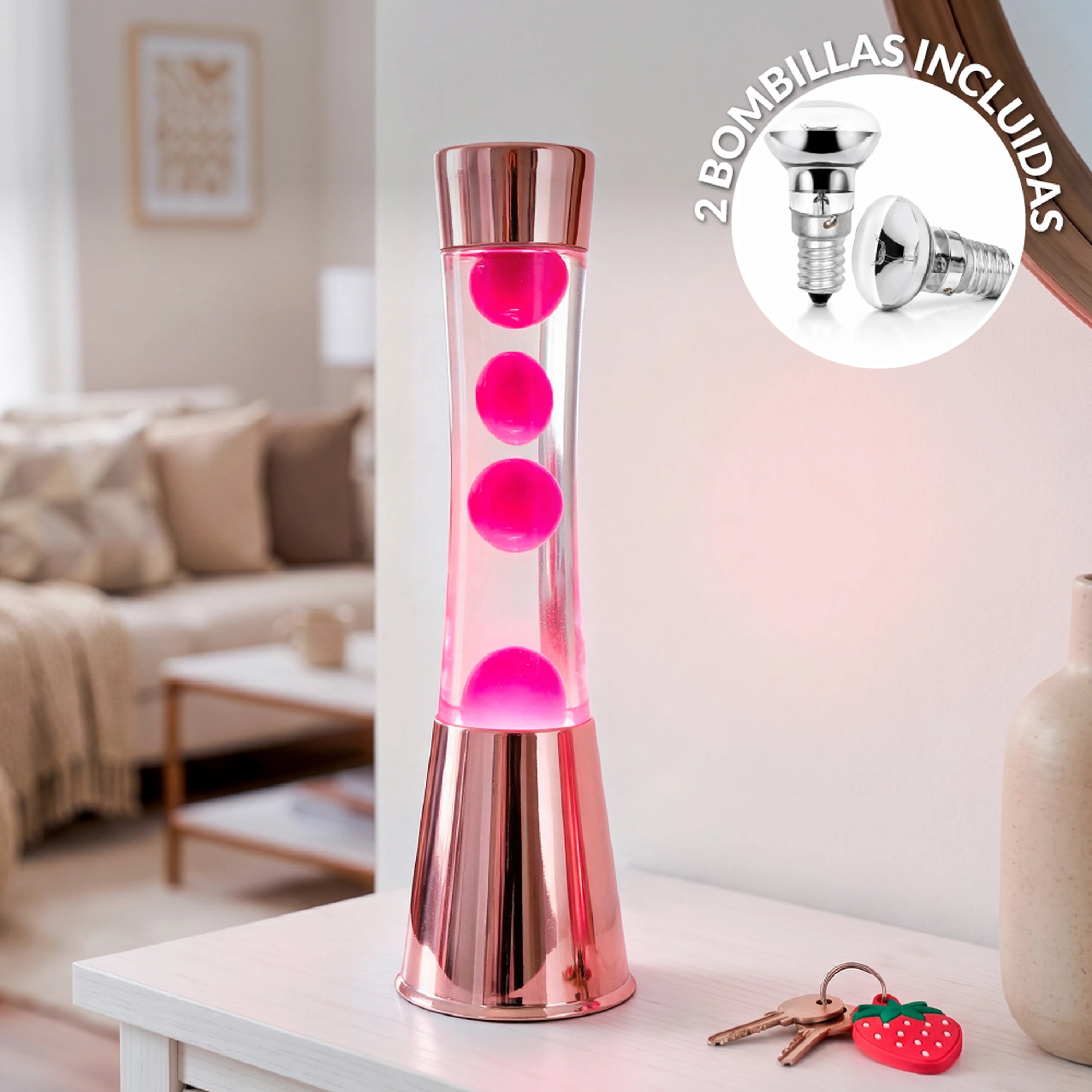 Lámpara de Lava con base oro rosa, líquido transparente y lava magenta