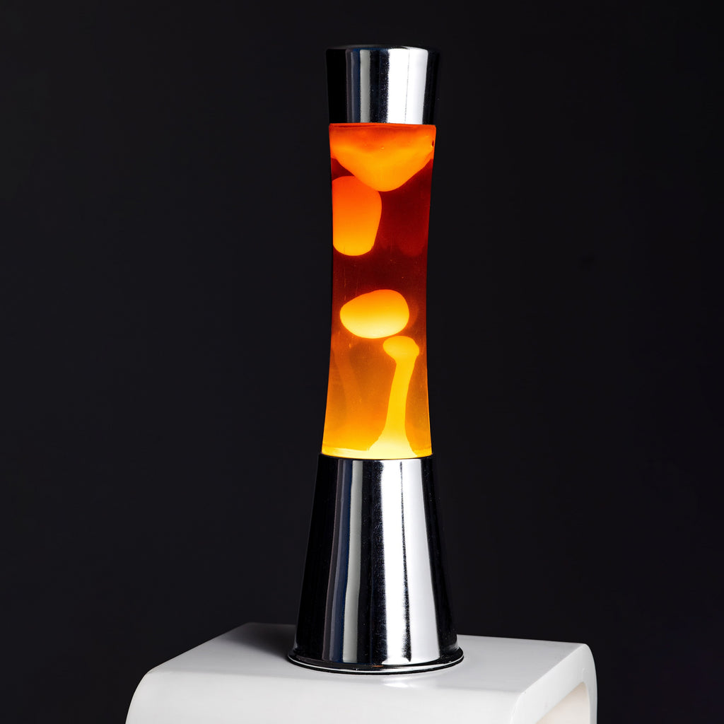 Lámpara de Lava con base cromo, líquido transparente y lava naranja