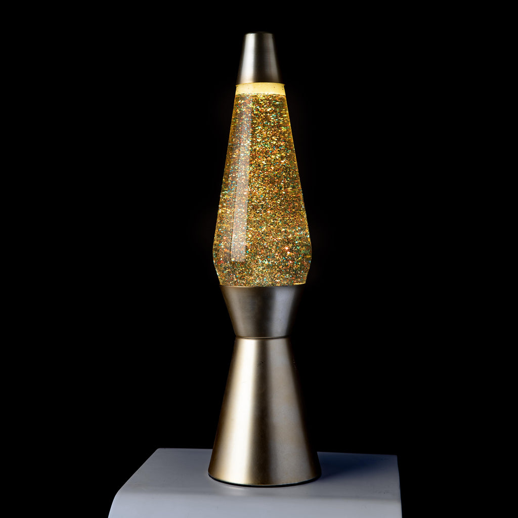 Lámpara de Lava 'Bullet' con base oro mate, líquido transparente y lava purpurina oro